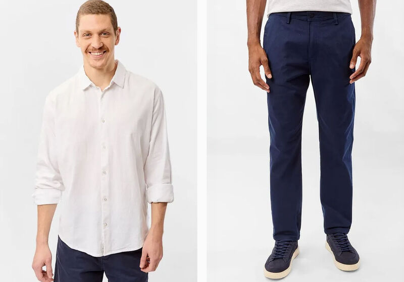 Homem com camisa branca e calça azul escura
