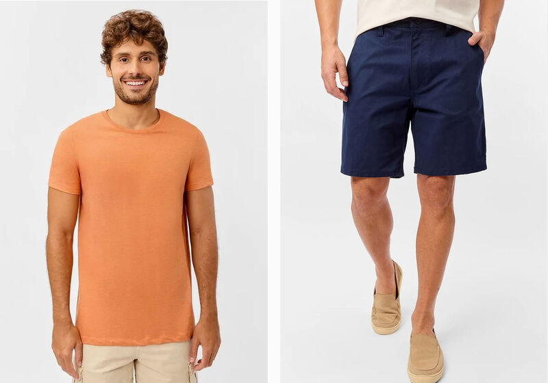 Modelo usando camiseta laranja e bermuda azul